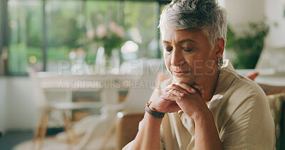 Buy stock photo Mature woman, prayer and faith on sofa in home for gratitude, worship and hope in living room. Person, eyes closed and religion on couch with spirituality, God or Christianity in lounge at apartment