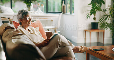 Buy stock photo Old woman, happy and reading a book on sofa for cognition, literature story and retirement hobby. Senior, reader and best seller novel in home for fantasy fiction, leisure activity and weekend break