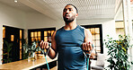 Fitness, man and resistance band for bicep exercise, strength and breathing for power in home. Equipment, muscle curls and person stretching for training, workout arms and bodybuilding for health