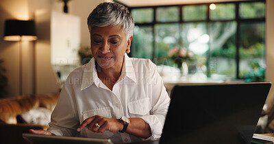 Buy stock photo Mature woman, tablet and remote work from home with typing, review and smile with project management. Person, virtual assistant and tech with click, feedback or application for freelance job at house