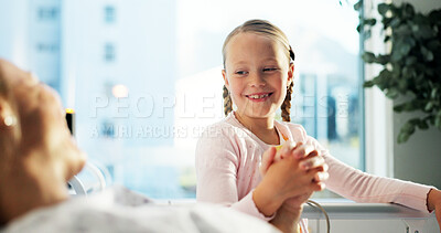 Buy stock photo Sick mother, kid and holding hands in hospital bed for comfort, care or hope for medical recovery. Clinic, smile and child support mom for healthcare, empathy or wellness after surgery with healing