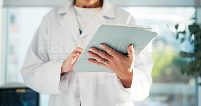 Buy stock photo Hands, tablet and doctor in hospital for research, telehealth or online medical consultation. Healthcare, technology and physician woman with wellness app, website or internet schedule in clinic