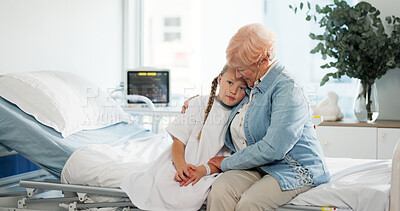 Buy stock photo Hug, medical and grandmother with child in hospital for support, pediatric patient and love. Healthcare, empathy and icu recovery with senior person and kid in clinic bed for family comfort and trust