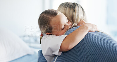 Buy stock photo Girl, mom and hug in hospital, bed and bonding with support for recovery, wellness and love. Child, mother and daughter with embrace, family and rehabilitation with healthcare at pediatric clinic