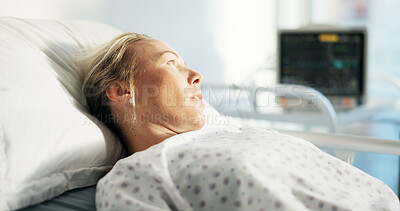 Buy stock photo Thinking, healthcare and sad woman in hospital bed for healing, reflection and icu recovery. Mental health, vision and medical with person in clinic for emergency care, patient and treatment