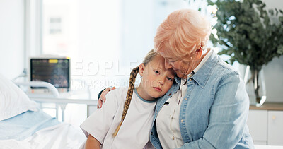 Buy stock photo Hug, healthcare and sad with grandmother and child in hospital for support, pediatric patient and care. Medical, empathy and depression with senior person and kid for family comfort and trust