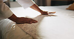 Cleaning, hands and blanket with person and bed for housekeeping, dusting and hospitality. Mattress, fabric and duvet bedding with closeup of cleaner in bedroom of hotel for hygiene, tidy and chores