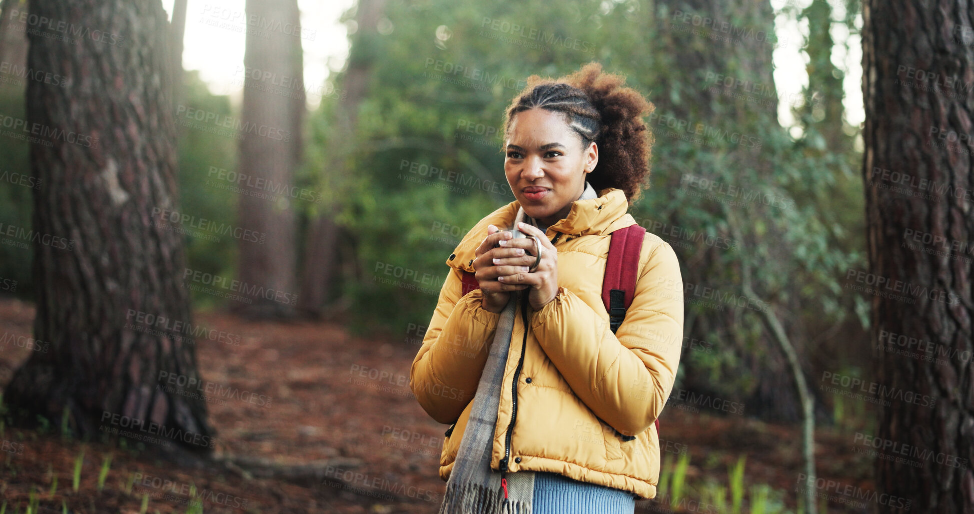 Buy stock photo African woman, coffee and hiking in jungle for cold morning, travel and trekking adventure. Smile, female person and warm beverage for backpacking, enjoy aroma and reflection for sightseeing in woods