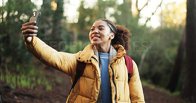 Buy stock photo Selfie, hiker and woman with smile in woods, travel or post for social media, backpacking or online. Outdoor, influencer and person with memory for adventure, profile picture or photography in forest