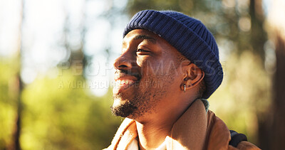 Buy stock photo Breathing, fresh air and man in nature, hiker or calm on vacation in woods, wellness or backpacking. Hiking, backpacker and black person in forest, peace and mindfulness on holiday and free time