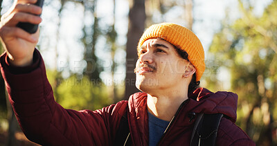 Buy stock photo Signal, search and man with smartphone, forest or lost connection on vacation, online or frustrated. Outdoor, hiker and person with poor reception on mobile, holiday or slow internet in woods or trip