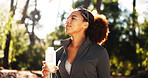 Happy woman, thinking and forest with water bottle for hiking, hydration or natural sustainability. Female person, hiker or runner with mineral liquid for thirst, drink or fitness break in nature