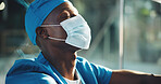 Sad, black man and healthcare with doctor in hospital for surgery error, patient death and depression. Medical malpractice, insurance liability and emergency with tired person in clinic for mistake