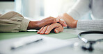Doctor, patient and hands with comfort for sympathy, understanding or trust at clinic office. Healthcare, medical worker or client with touch for empathy, breaking news or health support at hospital