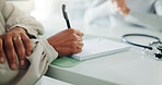 Doctor, hands and writing with book for patient prescription, diagnosis or checklist at clinic. Nurse, notes and healthcare worker with pen for medical treatment or pharmaceutical script at hospital