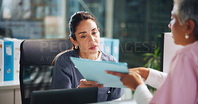 Buy stock photo Nurse, admin and discussion with document at reception for medical report, schedule or records. Folder, healthcare team or paper in clinic with women for results, feedback or surgery info for surgeon