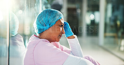 Buy stock photo Thinking, doctor and woman in hospital with stress for surgery mistake, operation and medical crisis. Healthcare, mature surgeon and sad person with guilt, worry and upset for patient loss in clinic