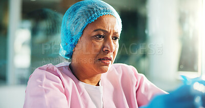 Buy stock photo Thinking, doctor and woman in hospital with worry for surgery mistake, operation and medical crisis. Healthcare, mature surgeon and sad person with guilt, stress and upset for patient loss in clinic