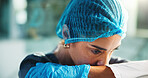 Thinking, sad and doctor in hospital with worry for surgery mistake, operation failure and medical crisis. Healthcare, surgeon and person with guilt, stress and upset for patient loss in clinic