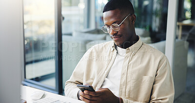 Buy stock photo Businessman, texting and chatting with phone at office for communication, research or email. Man, employee or creative designer typing on mobile smartphone app for social media or news at workplace