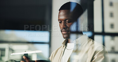 Buy stock photo Business, office and black man reading with tablet for copywriting, editing story or blog. Window, digital technology and creative worker online for review, content writing and microcopy in startup