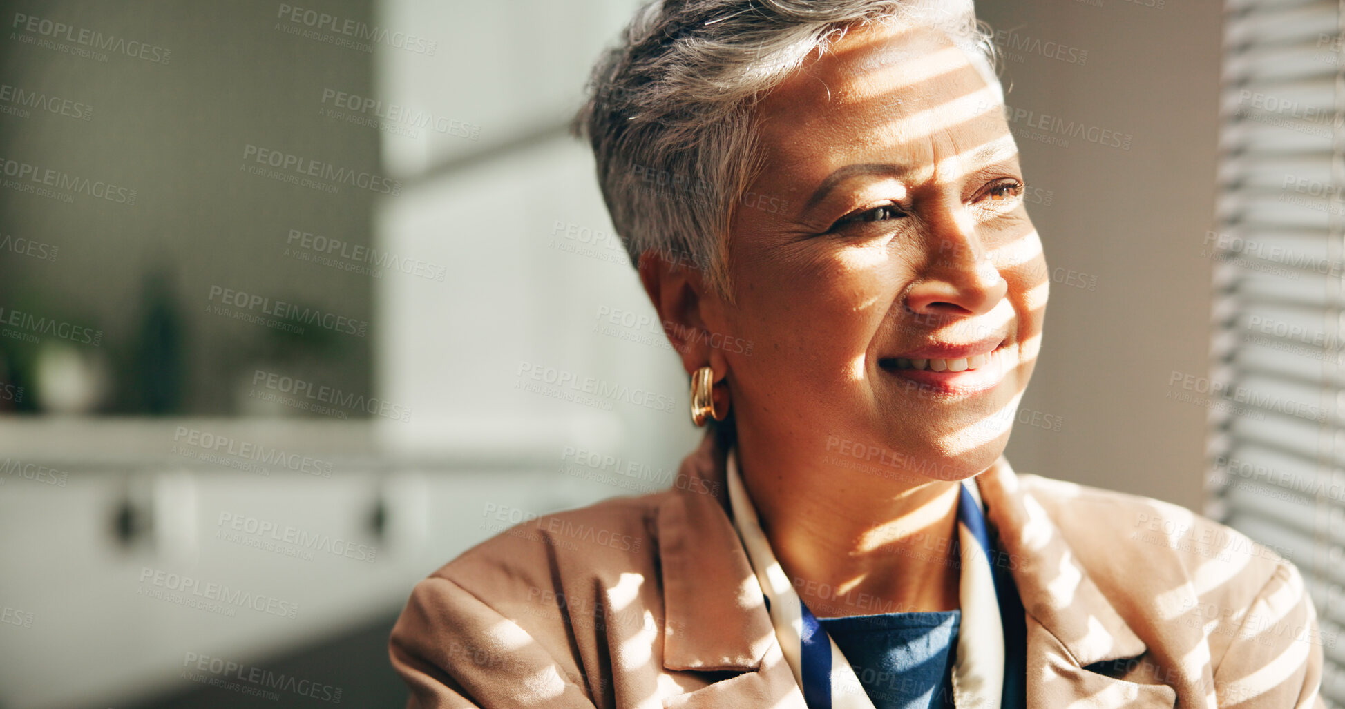 Buy stock photo Smile, vision and window with business woman in office for inspiration, planning or thinking. Face, sunlight and view with happy mature employee in corporate workplace for future, idea or opportunity