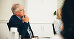 Business man, boardroom or listen in presentation for finance pitch, funding request and feedback. Financial stakeholders, mature person and discussion in office for investment briefing and proposal