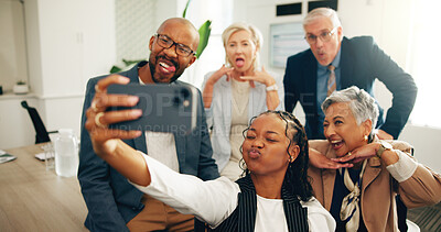 Buy stock photo Corporate, selfie and colleagues with silly faces, profile picture or celebration for collaboration. Goofy, people and photography of team in office, playful and post for social media or happiness