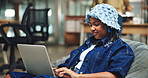 University, student and black woman with laptop, education and research for article, internet and email. College, computer and African person with tech, planning and assignment with elearning or exam