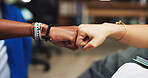 College, hands and students with fist bump in library for learning success, exam results or support. Education, university or people with gesture on campus for assignment goal or scholarship approval