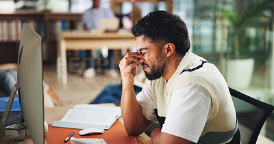 Buy stock photo Frustrated, headache and man at university in library for learning, education and studying. College, school and student with notes, books and pc for project with eye strain, burnout and stress