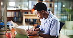 Writing, college student and black man in library for reading, learning and research project. University, creative or male person with tablet on campus for education, development or studying notes