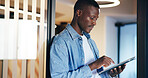 Business, tablet and black man in office, internet and research for web design. African person, employee and consultant in workplace, tech or digital app with creativity, online reading or connection