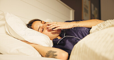Buy stock photo Comfortable, sleeping and yawn with woman in bed for morning or weekend break and wellness. Fatigue, rest and tired with person asleep in bedroom of apartment for dream, exhaustion or recovery