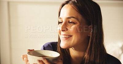 Buy stock photo Woman, smile and coffee in bedroom at house for morning start, enjoy espresso and happy thoughts. Female person, thinking and beverage for peace, nostalgia memories and herbal tea of wellness in home