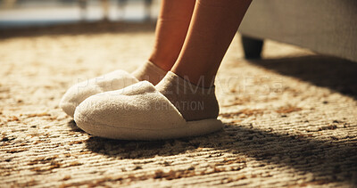 Buy stock photo Person, legs and slippers in bedroom at house from sleeping, wake up and morning routine. Closeup, feet and woman with shoes, comfortable footwear and getting ready to start day, bed rest and cozy
