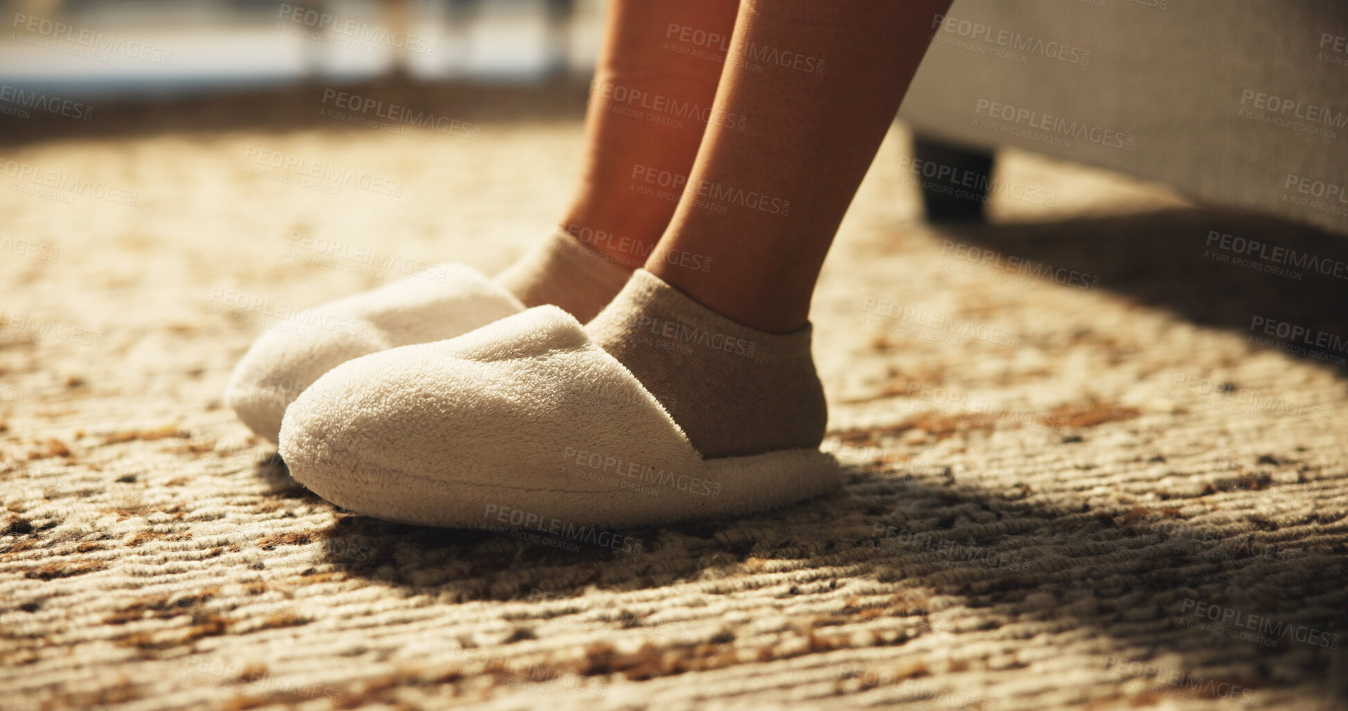 Buy stock photo Person, legs and slippers in bedroom at house from sleeping, wake up and morning routine. Closeup, feet and woman with shoes, comfortable footwear and getting ready to start day, bed rest and cozy