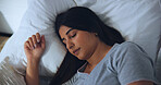 Above, comfortable and sleeping with woman in bed for morning or weekend break and wellness. Exhausted, fatigue and rest with tired person asleep in bedroom of apartment for dreaming, nap or recovery