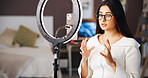 Woman, talk and ring light at house for vlog, live streaming and tips for content creation. Female influencer, tech and chat to audience of broadcast, tutorial instructions and advice for subscribers