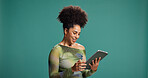 Tablet, smile and woman in studio for reading fashion blog, email or social media. Digital technology, online chat and happy African model download app, trendy article or mockup space on background