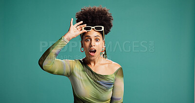 Buy stock photo Shocked, fashion and happy woman in studio with mouth open, wow and alert for announcement. African person,  surprise and portrait for drama, discount or gossip on green background with space
