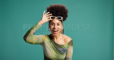 Buy stock photo Shocked, fashion and excited woman in studio with mouth open, wow and happy for announcement. African person,  surprise and portrait for expression, discount or gossip on green background with space