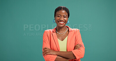 Buy stock photo Black woman, portrait and business owner in studio with confidence, fashion designer and happy. Entrepreneur, arms crossed and smile on green background space for about us, brand clothing and startup