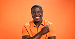 Fashion, happy and portrait of black man in studio with trendy clothes, outfit and cool style. Confidence, mockup space and person with positive attitude, pride and smile on orange background