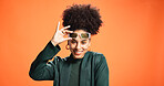 Portrait, woman and sunglasses for fashion in studio background, trendy clothes or announcement. African female person, stylish shades and smile for retro aesthetic, elegant outfit and sales discount