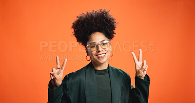Buy stock photo Smile, portrait and woman with peace sign, glasses and social media influencer for fashion. Happy African model, studio and v hand gesture for victory symbol or emoji on orange background with space