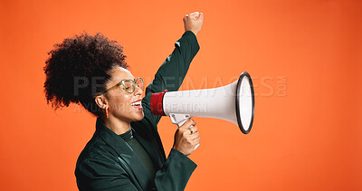 Buy stock photo Happy, fist and African woman with megaphone for democracy vote, justice or human rights rally. Orange background, announcement and proud speaker with racism voice opinion, power and studio space
