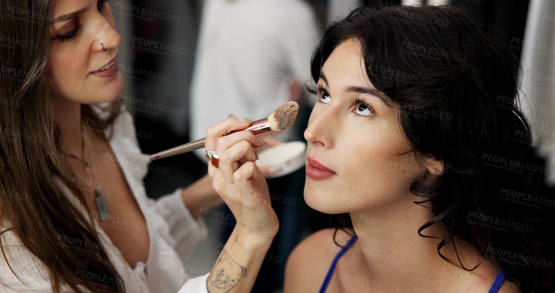 Buy stock photo Preparation, beautician and makeup for model, set and behind the scenes for photoshoot and creative. Getting ready, women and people with cosmetics for makeover, production and artistic routine