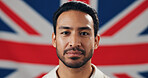 Portrait, confident and man with British flag for pride, culture and government elections. Face, person and country banner for loyalty, national patriotism and voter with union jack in United Kingdom