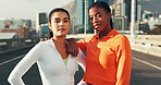 Runners, women and athletes in city for fitness, activity or workout together on bridge. Confident, sports and portrait of female people with bonding for cardio exercise or training in urban town.